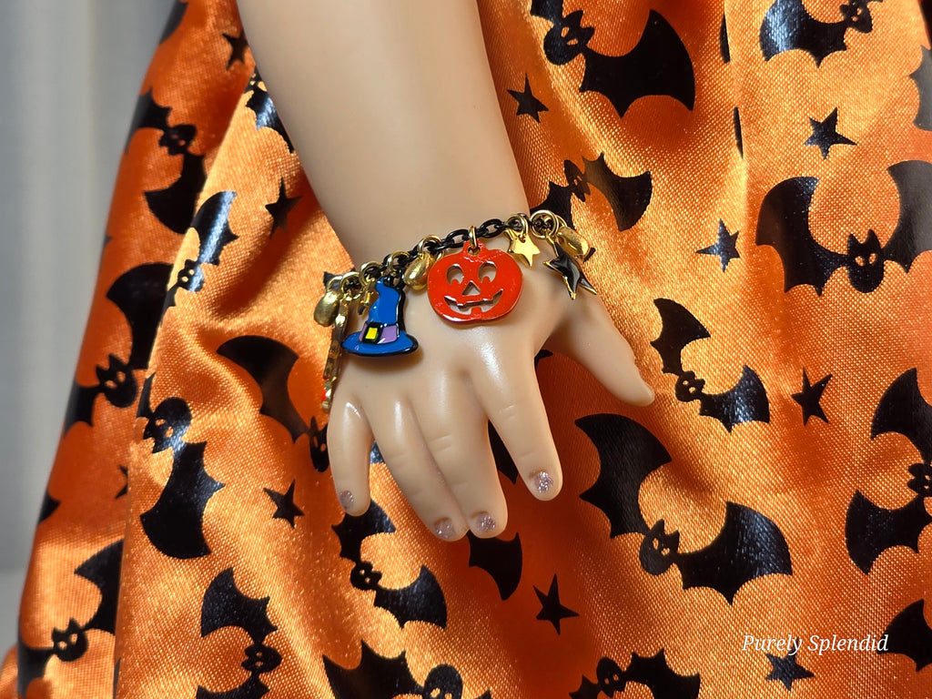 18 inch doll charm bracelet with pumpkin, star and witches hat