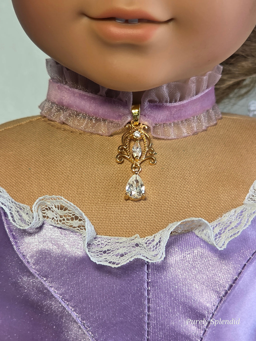 American made frilly light purple velvet Rococo choker necklace with sparkling center pendant and crystal dangle for 18 inch girl dolls | Purely Splendid
