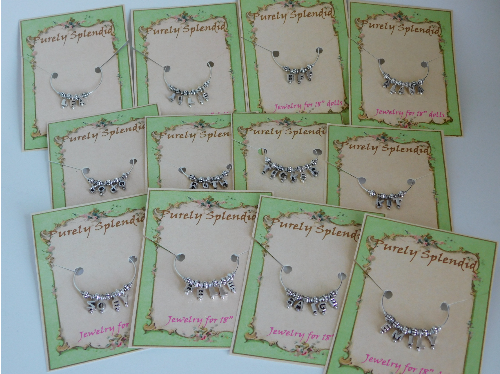 12 Name Bracelets each on a Purely Splendid display card. Bracelets read Lea, Julie, BFF, Alana, XOXO, Ruth, Tucker, Kit, Zoey, Belle, Saige, Emily