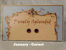 Load image into Gallery viewer, a pair of January - Garnet Birthstone studs on display card 
