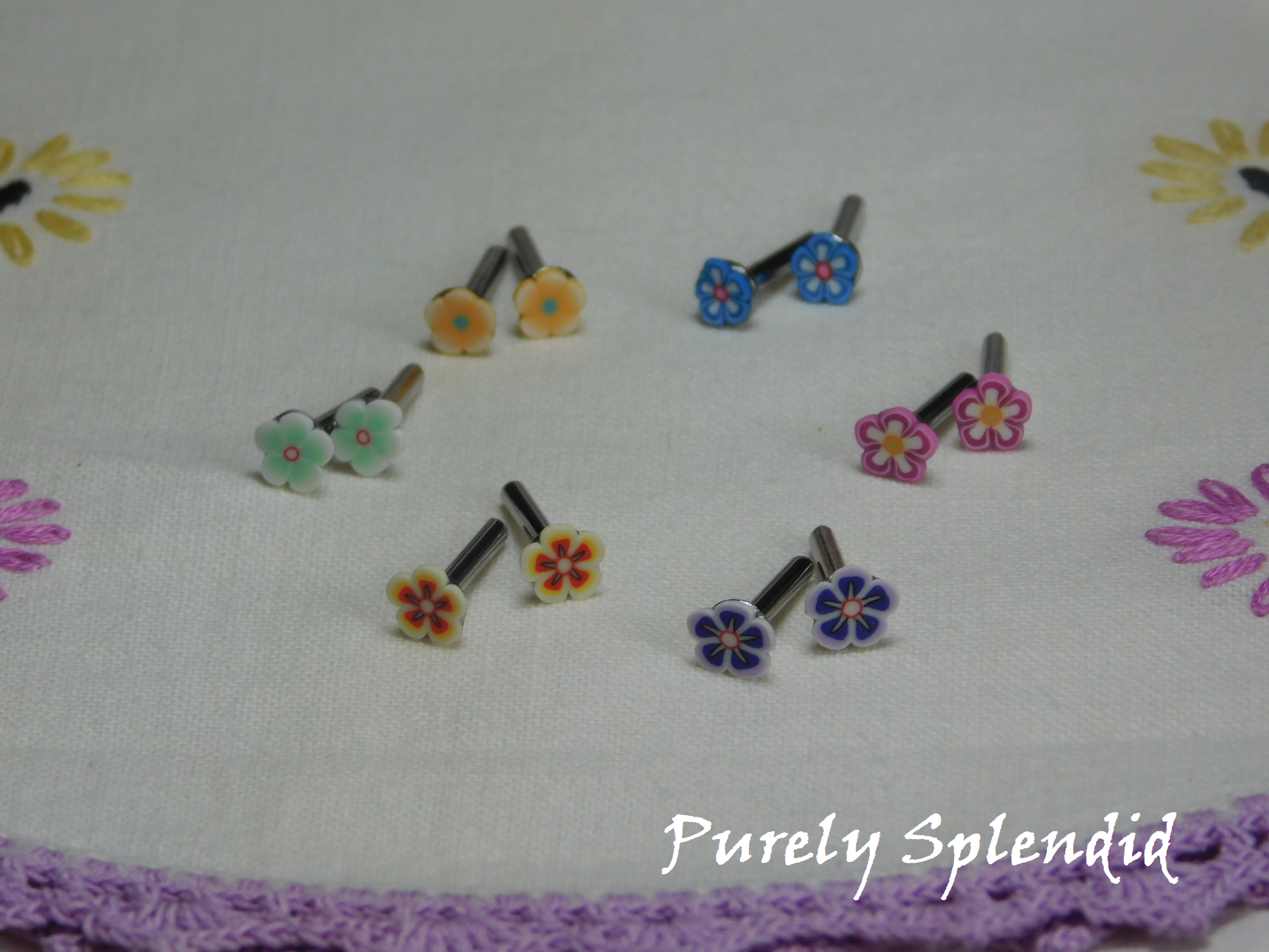 Six pairs of colorful Flower Studs for dolls