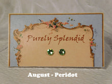 Load image into Gallery viewer, a pair of August Birthstone Peridot Studs on a display card
