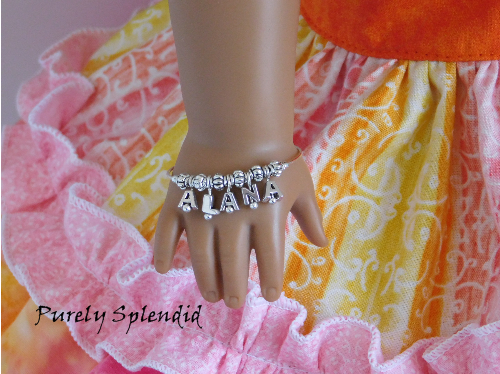 American Girl Doll shown wearing Name Bracelet with the name Alana
