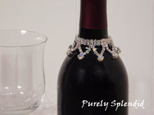Load image into Gallery viewer, close up of the Sparkling Aurora Borealis Wine Bottle Bling Necklace on a standard size wine bottle, reusable
