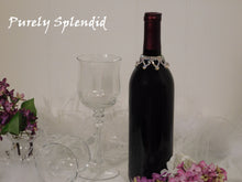 Load image into Gallery viewer, Sparkling Aurora Borealis Wine Bottle Bling Necklace shown on a standard size dark wine bottle
