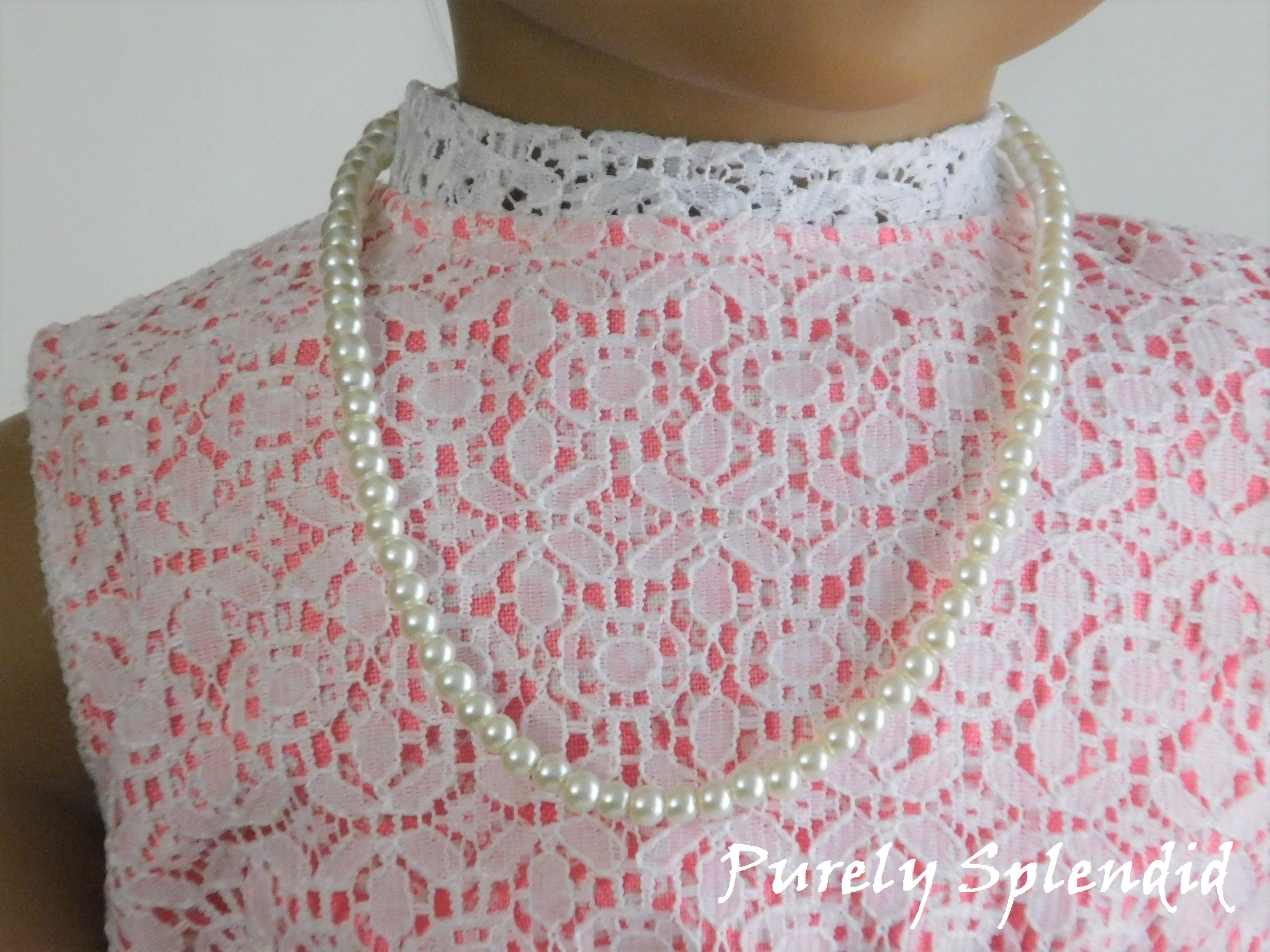 18 inch doll shown wearing the 8" Pearl Necklace