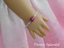 Load image into Gallery viewer, Crystal Stacking Bracelet with Magenta accents shown on an 18 inch doll
