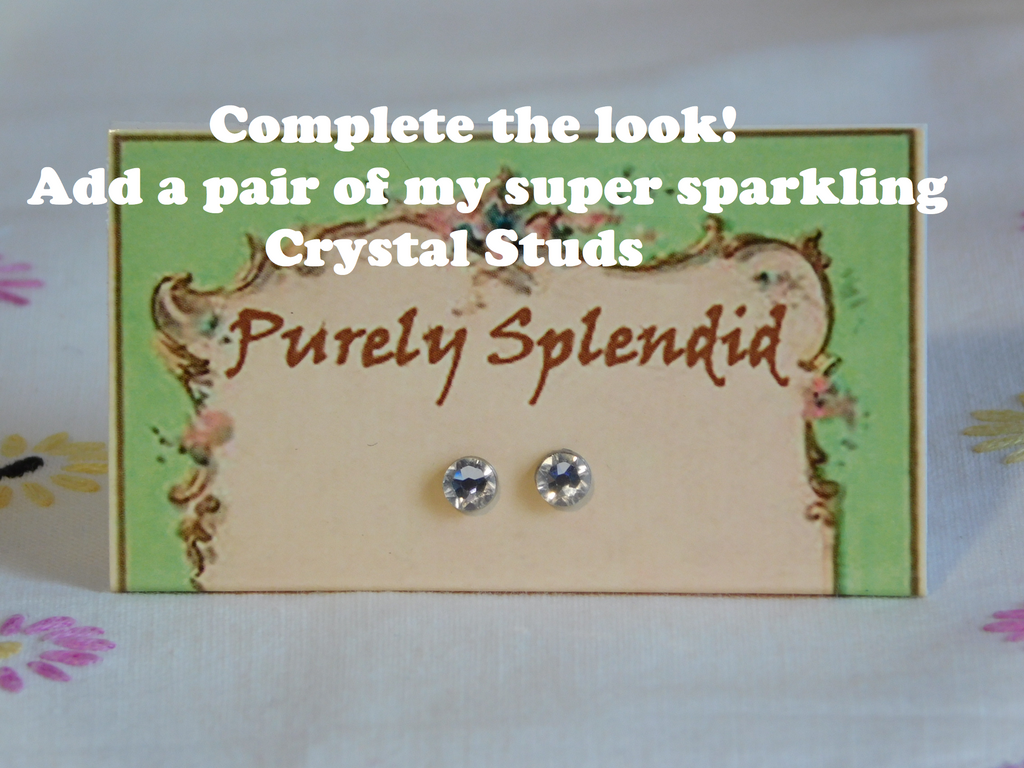 add a pair of Sparkling Crystal 2mm Studs for dolls 