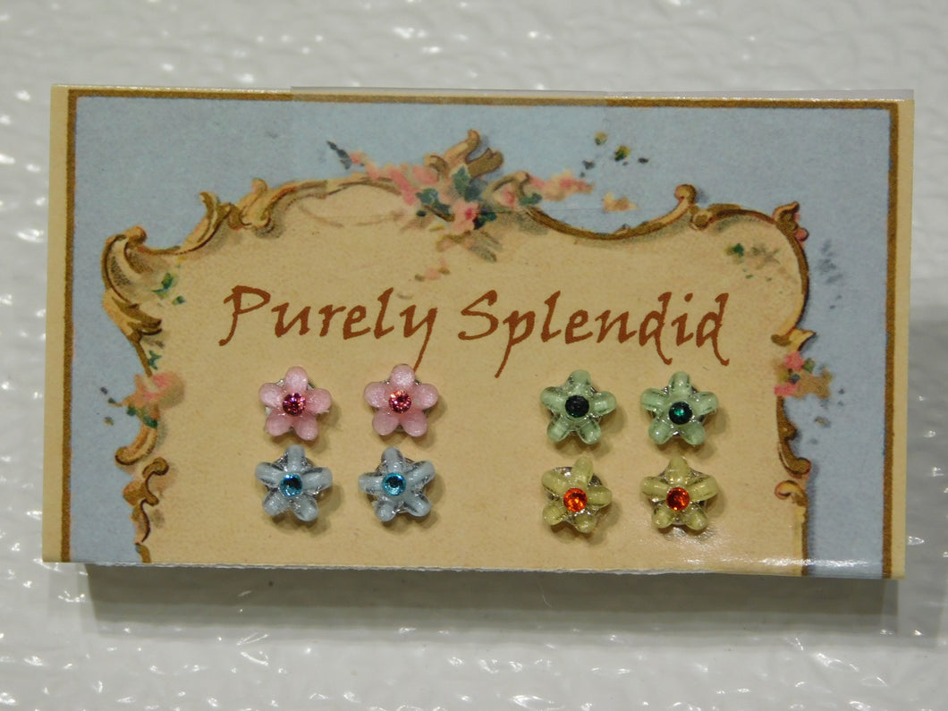 four pairs of Spring Flower 2mm Stud Earrings shown on a Purely Splendid presentation card. These five petal flowers come in light pink with a dark pink crystal center, light green with a dark green crystal center, light blue with a blue crystal center and yellow with an orange crystal center