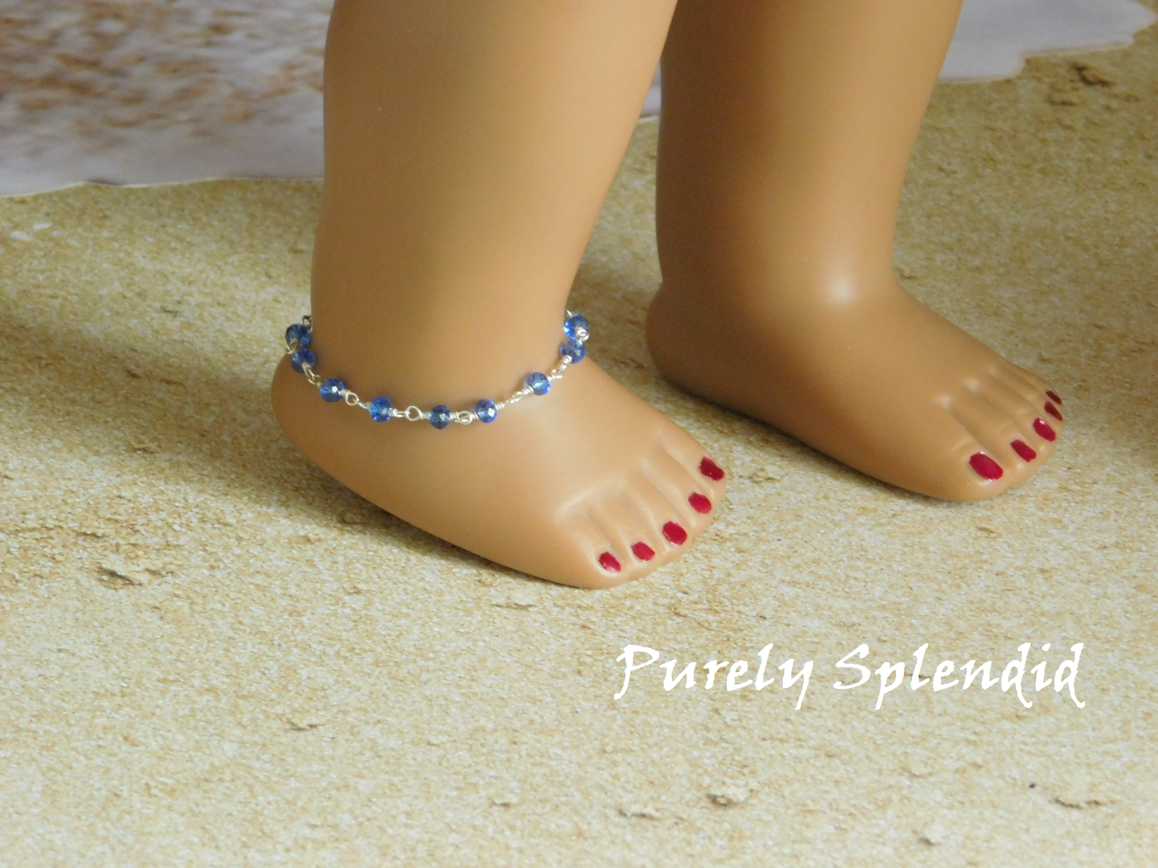 Dainty Ankle Bracelet in Crystal Blue shown on an 18 inch doll who has an 4 3/8" ankle
