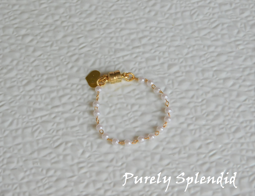 Dainty Pearl Bracelet single row shown on a white background