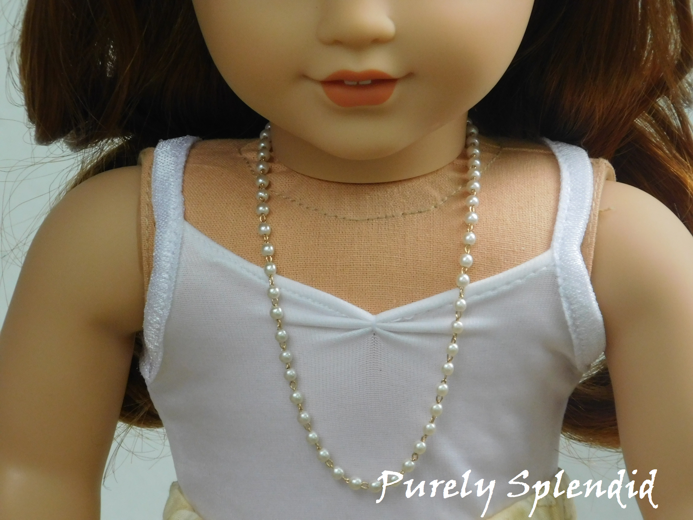 Long Dainty Pearl Necklace shown on an 18 inch doll