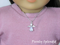 Dazzling Silver Angel Necklace shown on an 18 inch doll