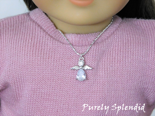 Dazzling Silver Angel Necklace shown on an 18 inch doll