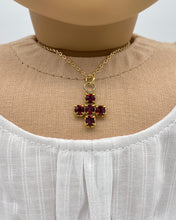 Load image into Gallery viewer, 18 inch doll wearing a sparkling red cross necklace
