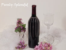 Load image into Gallery viewer, Sparkling Falling Rhinestone Bottle Bling shown on a standard size dark wine bottle
