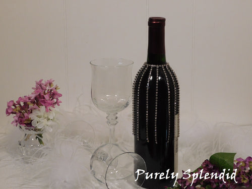 Sparkling Falling Rhinestone Bottle Bling shown on a standard size dark wine bottle