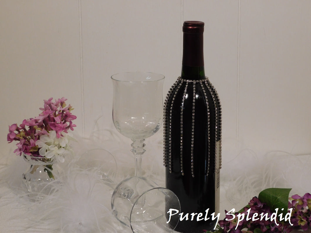 Sparkling Falling Rhinestone Bottle Bling shown on a standard size dark wine bottle