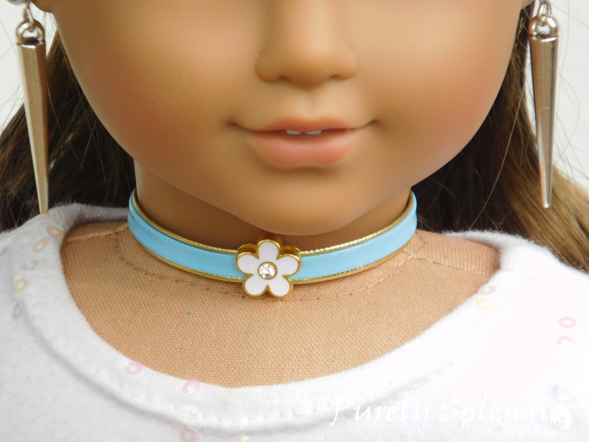 18 inch doll shown wearing a blue Flower Choker Necklace