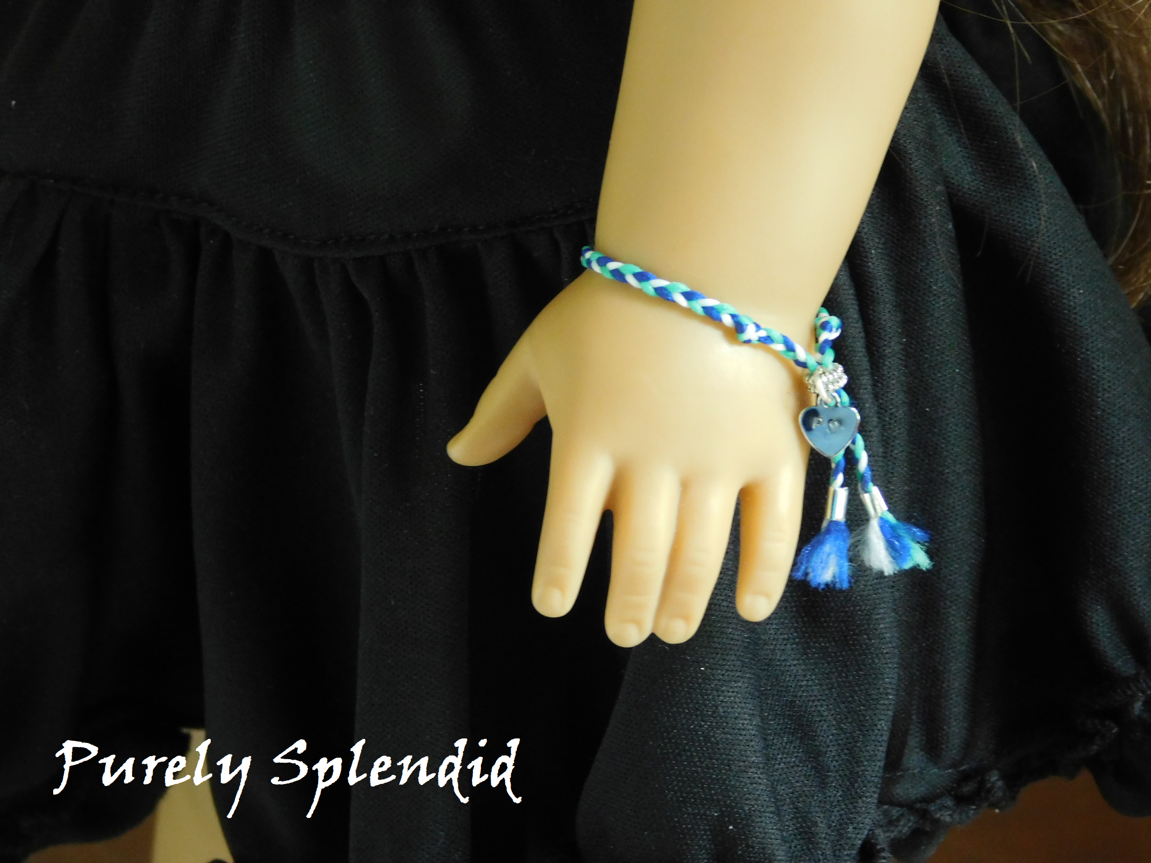 Blue and Green Friendship Bracelet shown on an 18 inch doll
