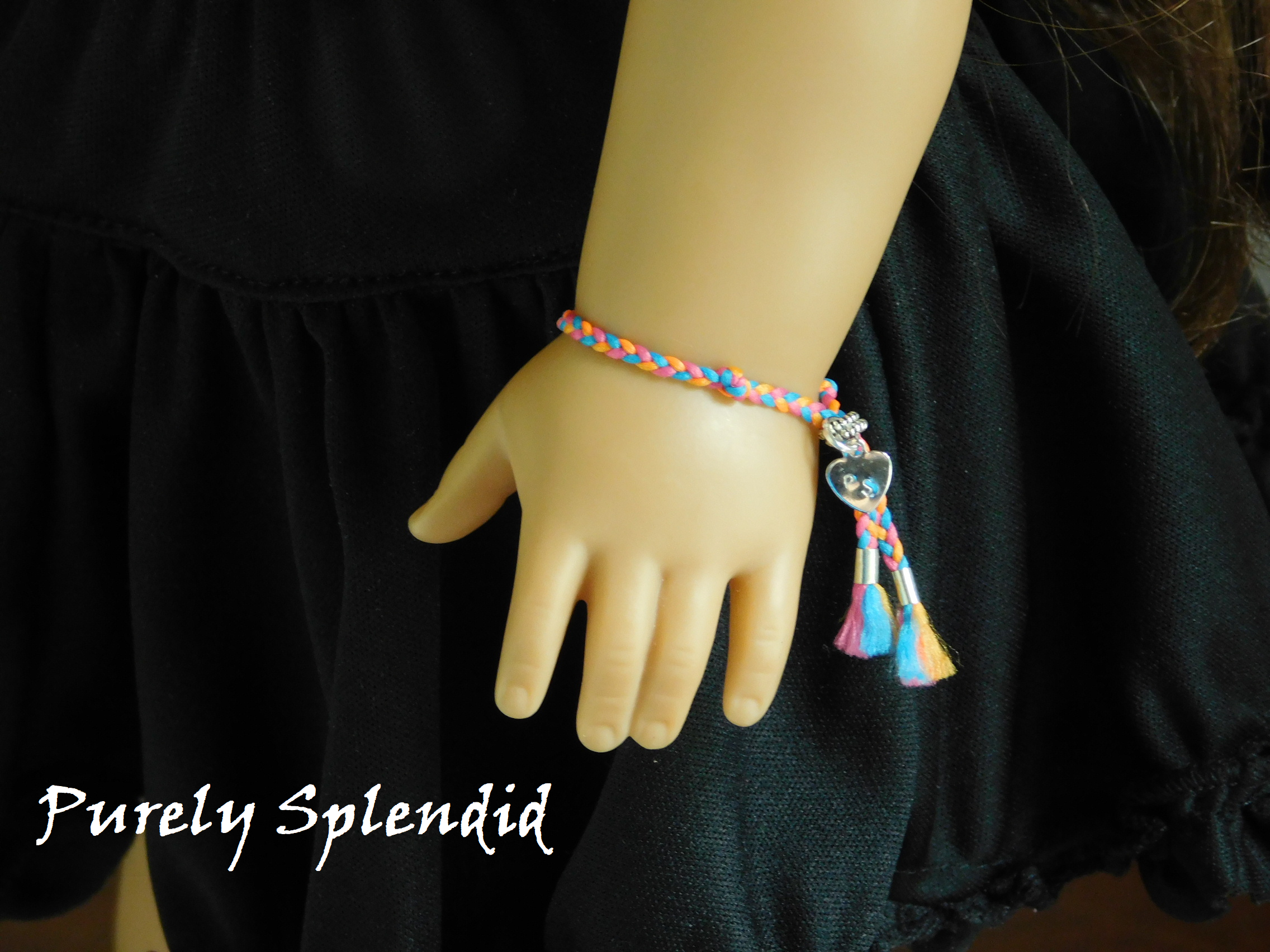 Orange Friendship Bracelet shown on an 18 inch doll