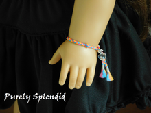 Load image into Gallery viewer, Orange Friendship Bracelet shown on an 18 inch doll
