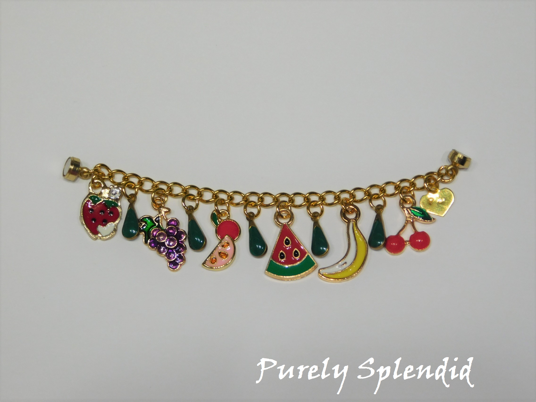 Fruit Salad Charm Bracelet on a white background