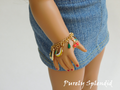 Fruit Salad Charm Bracelet shown on an American Girl Doll