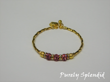 Load image into Gallery viewer, Gold bracelet with three round sparkling pink beads each surrounded with a ring of sparkle
