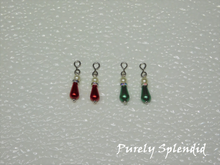 Load image into Gallery viewer, two pairs of Holiday Pearl Earrings one red pair and one green pair -long pear shaped pearl bead topped with a thin sparkling bead and large round white pearl bead 
