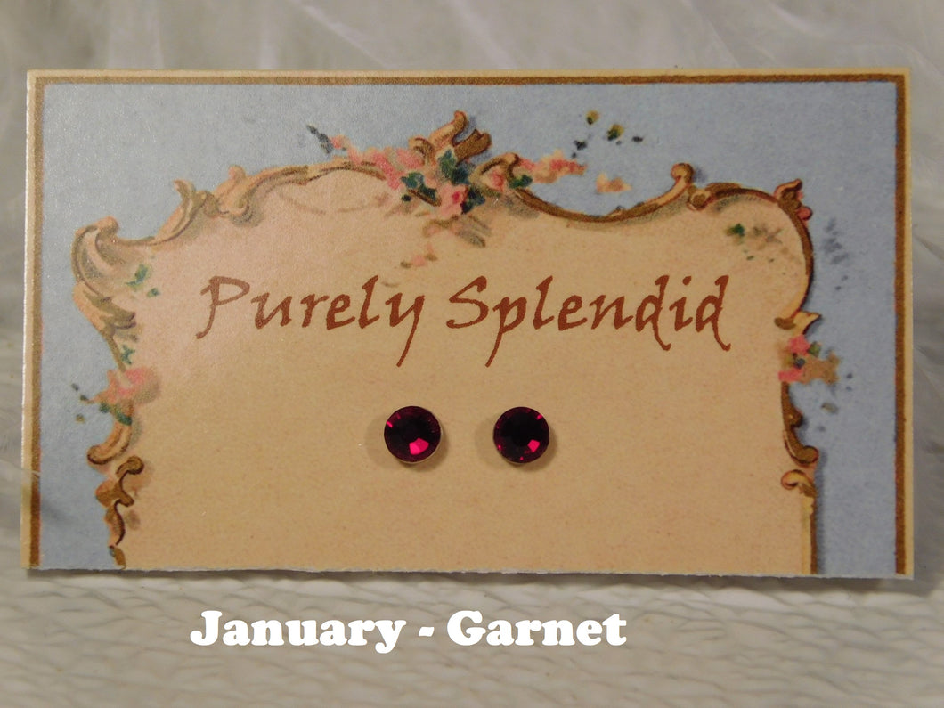 a pair of January - Garnet Birthstone studs for 18 inch dolls 