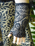 18 inch doll modeling a pair of Lacy Black Fingerless Gloves