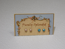 Load image into Gallery viewer, Light Turquoise and Light Peach Sparkling 2mm stud earrings shown on a Purely Splendid presentation card
