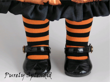 Load image into Gallery viewer, 18 inch doll dressed in a Halloween dress wearing a pair of Orange and Black Striped Tights and black shoes. Tights fit perfectly
