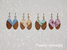 Load image into Gallery viewer, four color choices of the Oval Resin &amp; Wood Earrings - shown on a white background
