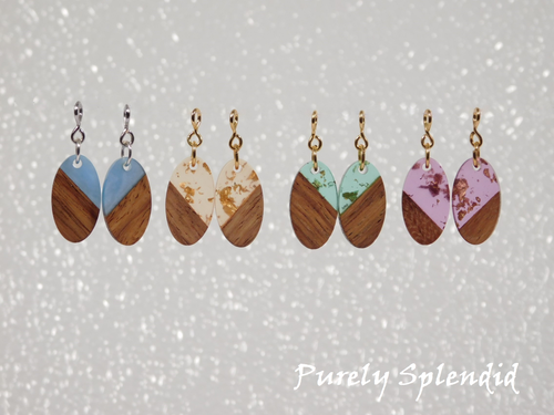 four color choices of the Oval Resin & Wood Earrings - shown on a white background