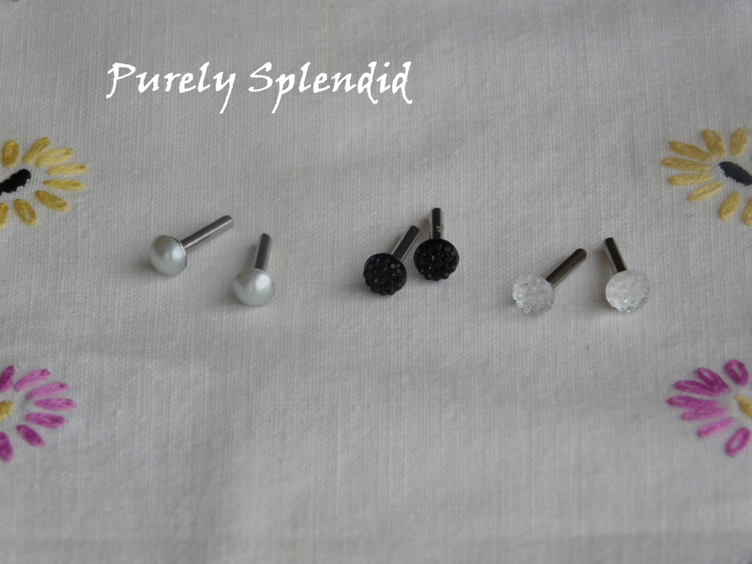 three pairs of 2mm studs pearl, black bumpy and crystal bumpy