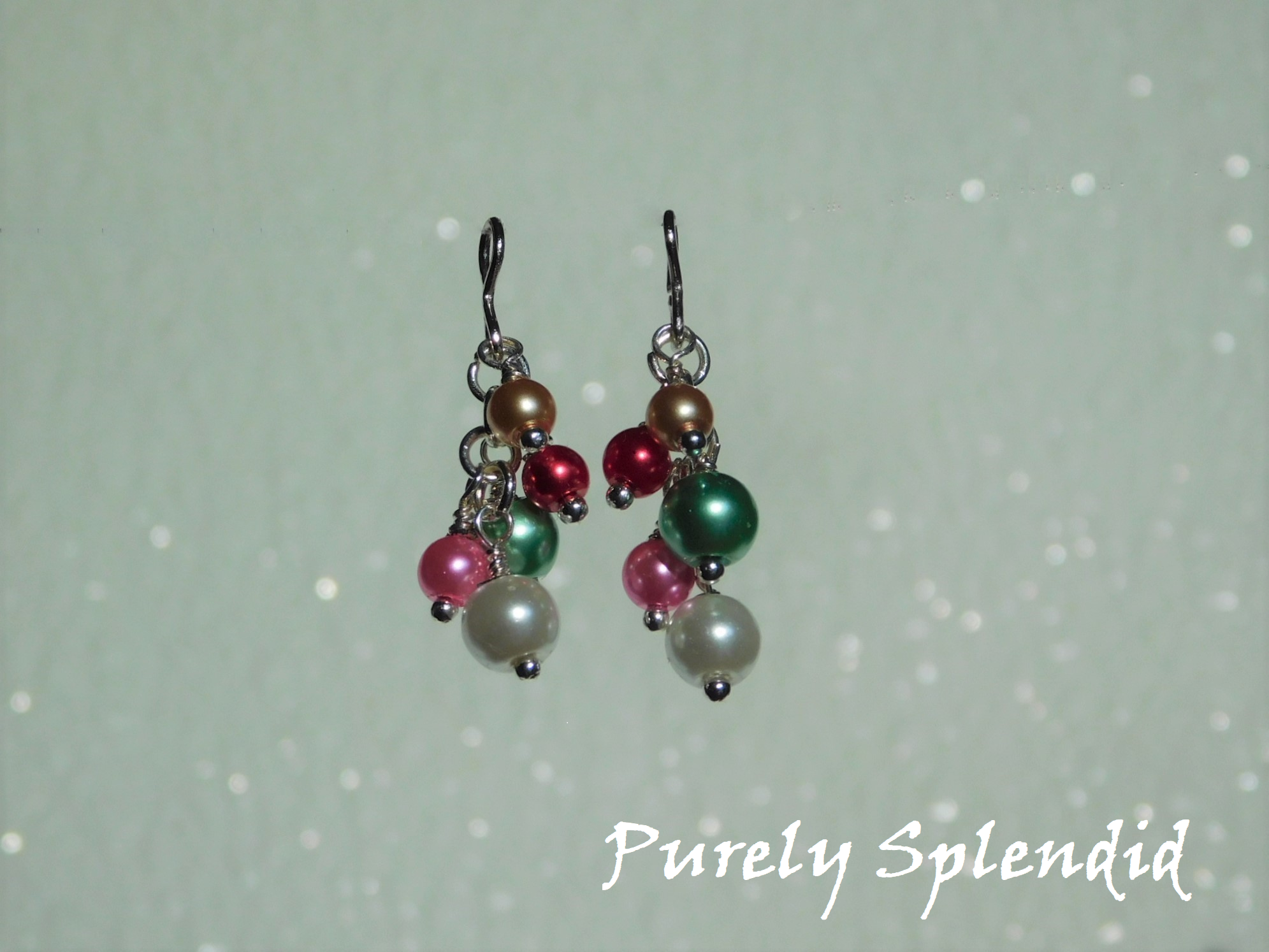 "to use with 2mm studs" shown with five colors of pearls hanging from a silver loop