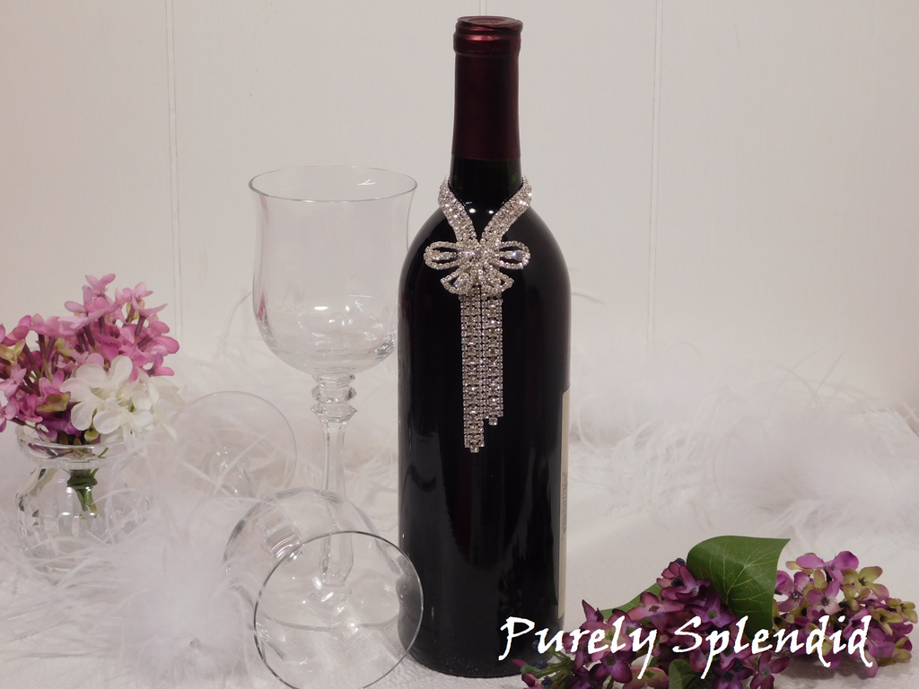 Sparkling Rhinestone Bow Bottle Bling shown on a standard size wine bottle