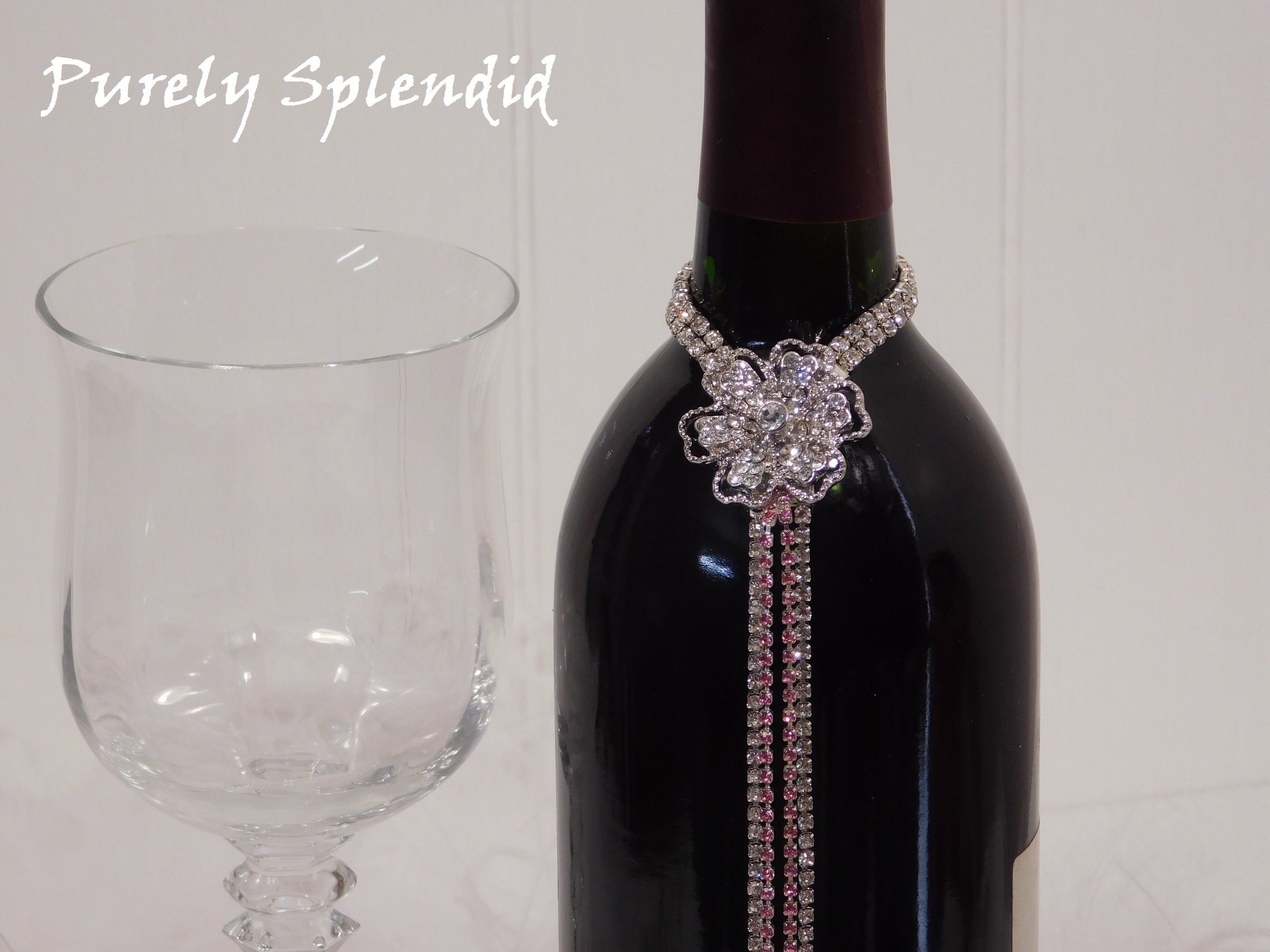 close up of the Sparkling Rhinestone Flower Bottle Bling on a standard wine bottle