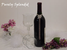 Load image into Gallery viewer, Sparkling Rhinestone Flower Bottle Bling with Pink Accents shown on a standard size wine bottle
