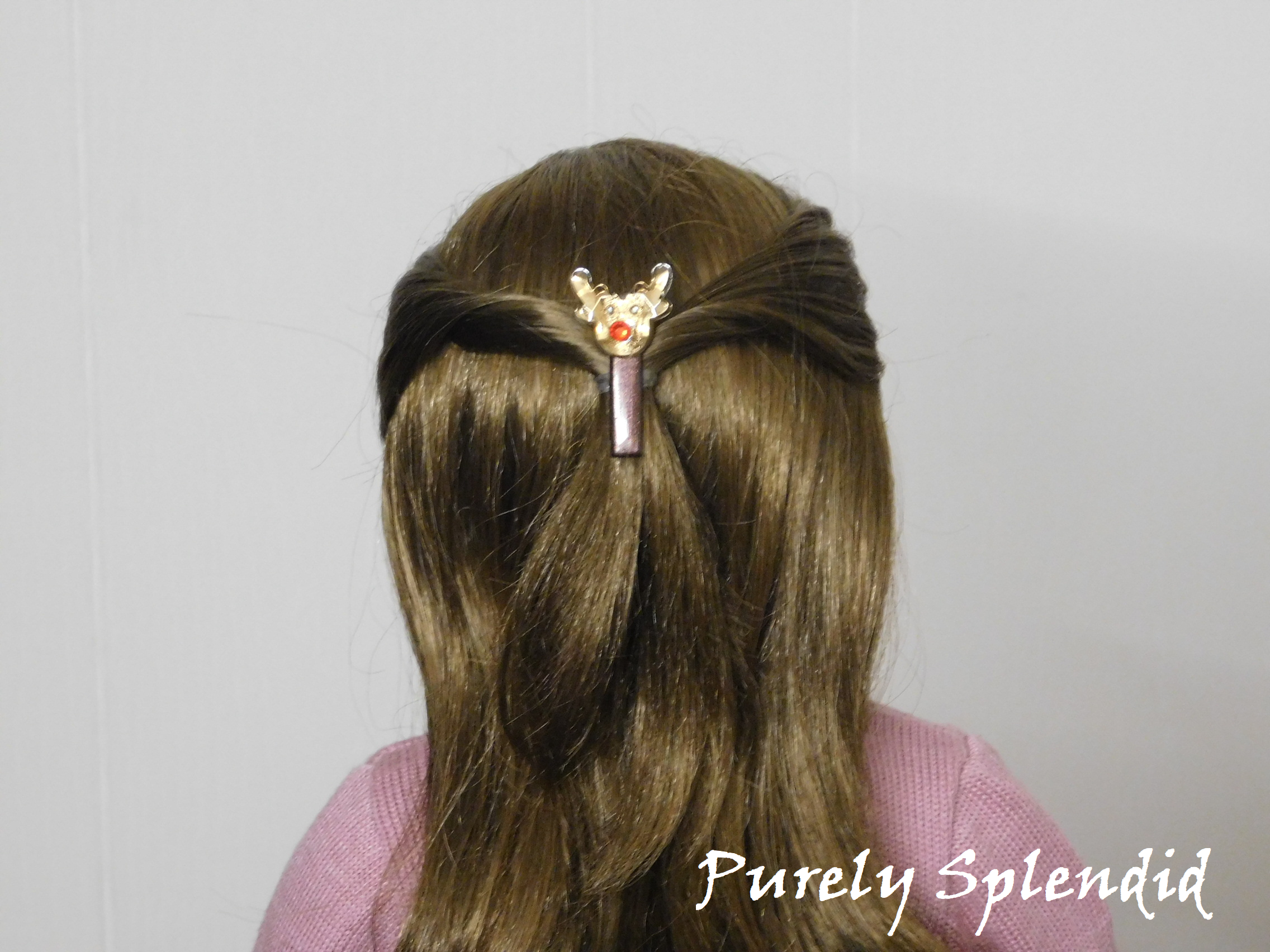 18 inch doll shown wearing one Rudolph Reindeer Hair Clip in her hair