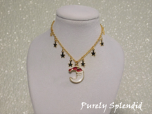 Load image into Gallery viewer, Cute Santa Moon charm on a gold chain that has mini gold star charms 
