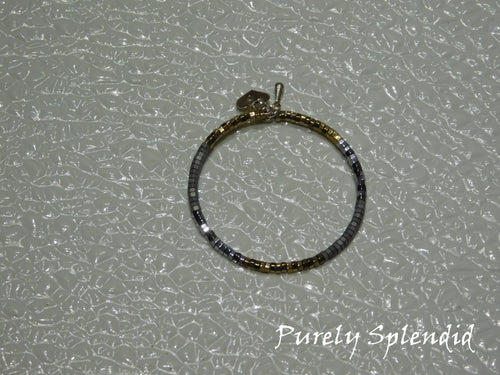 Silver and Gold micro beads make up this Silver and Gold Stacking Bracelet