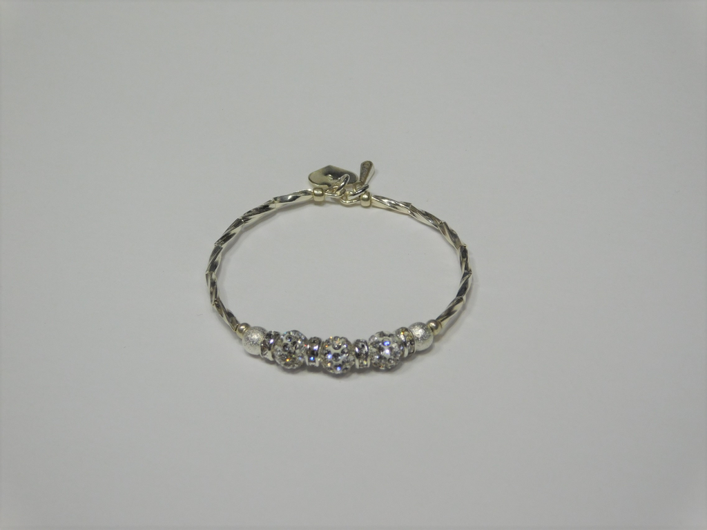 Silver bracelet with three round sparkling silver beads each surrounded with a ring of sparkle