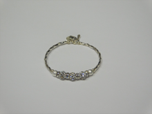 Load image into Gallery viewer, Silver bracelet with three round sparkling silver beads each surrounded with a ring of sparkle
