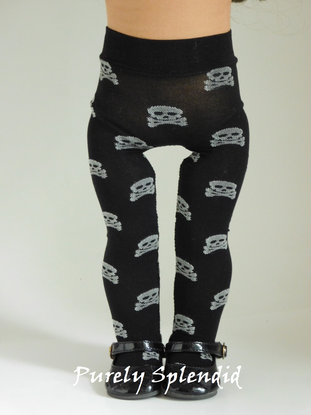 18 inch doll shown wearing a pair of Skull Tights