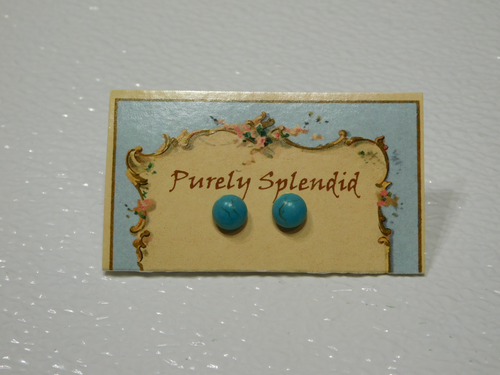 Large Sky Blue Studs for doll shown on a presentation card