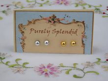 Load image into Gallery viewer, two pairs of Small Classic Colors 2mm Stud Earrings shown on a presentation card
