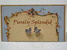Load image into Gallery viewer, Sparkling silver colored Butterfly 2mm Stud Earrings shown on a Purely Splendid presentation card
